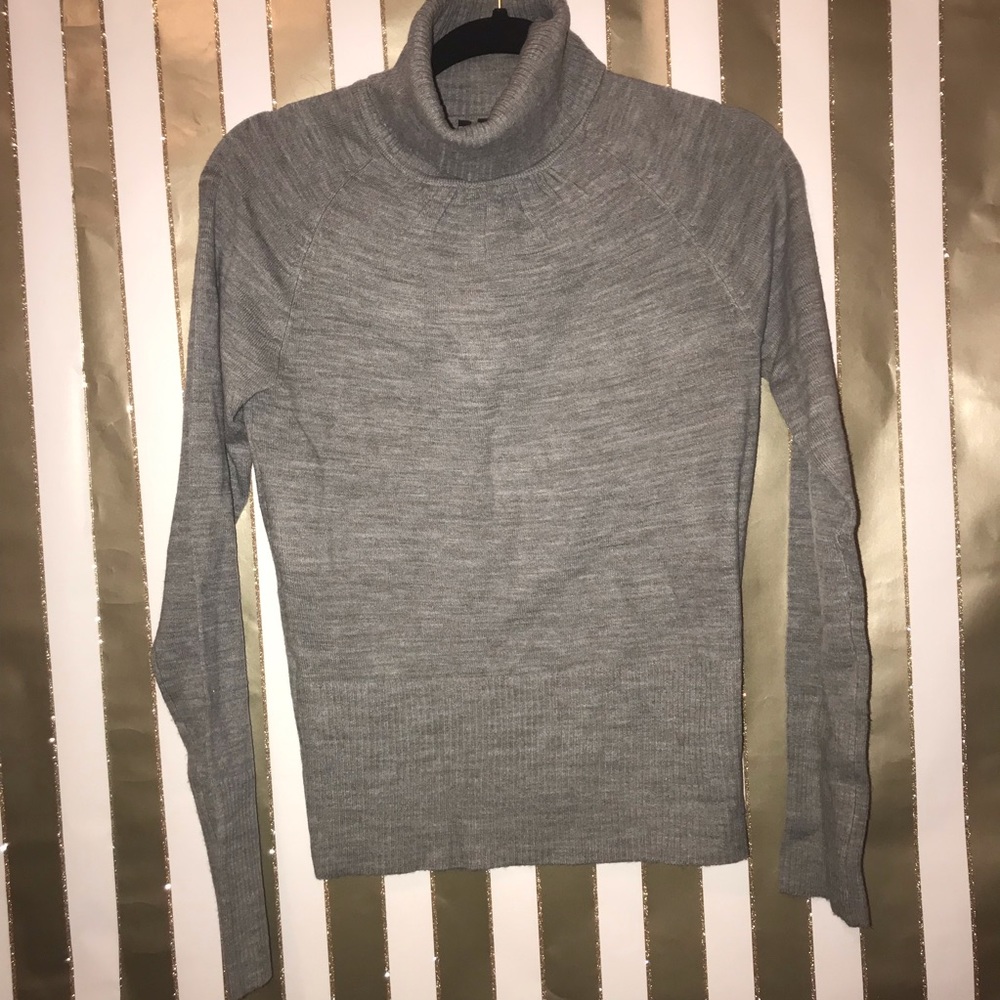 Grey form fitting turtle neck